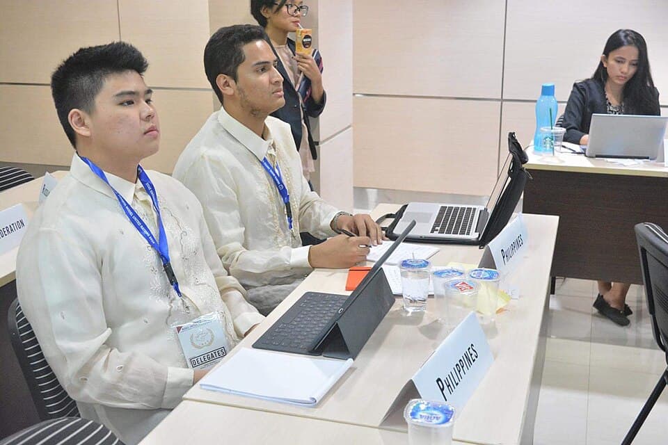 Students debating in a Model United Nations Security Council simulation