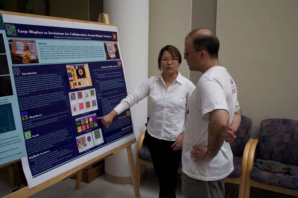 Student research poster session at an undergraduate symposium